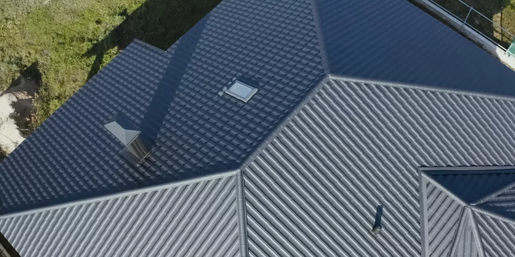 Aerial view of a metal roof on a house.