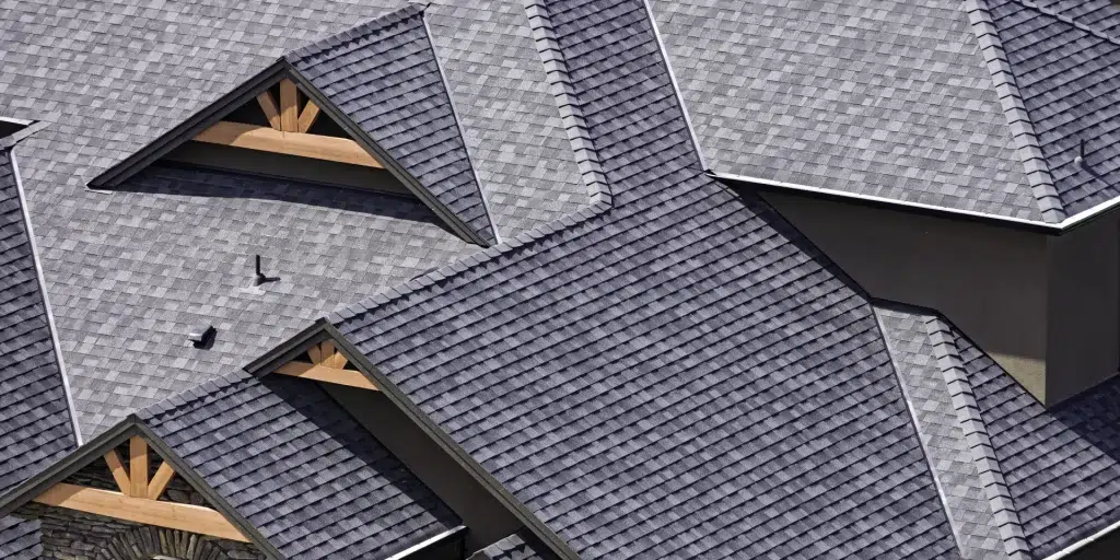 Aerial view of an asphalt shingle roof on a house.